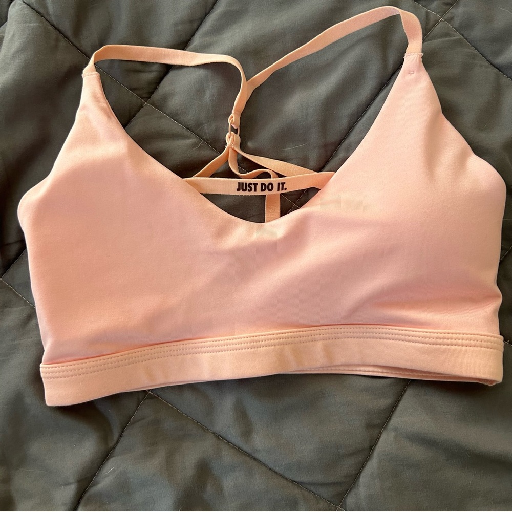 Small light orange Nike Dri-Fit sports bra